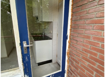 Deur Met Schade Aan De Vve Maasstraat Kleine Afbeelding